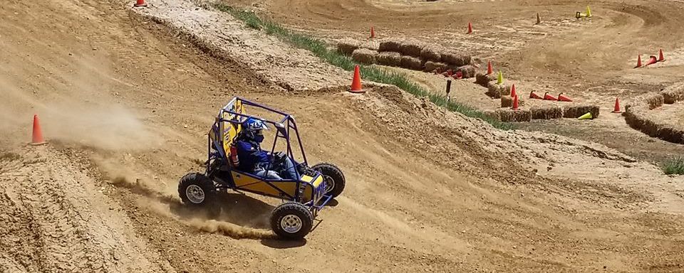 WVU Baja Car Number 99 Turning Laps in the Endurance Race.